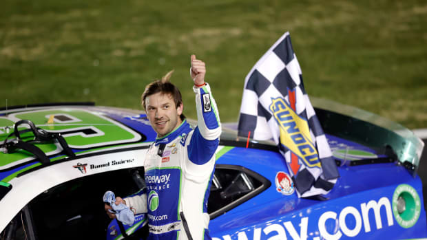 Daniel Suarez waves to the crowd after winning Sunday's NASCAR Cup Series Ambetter Health 400 at Atlanta Motor Speedway. (Photo by Alex Slitz/Getty Images)